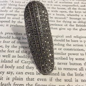 Marcasite and silver Pinky ring.